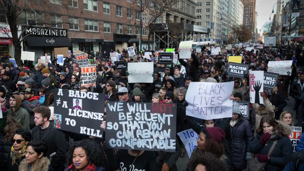 Demonstrators march in New York, Saturday, Dec. 13, 2014, during the Justice for All rally and march Demonstrators march in New York, Saturday, Dec. 13, 2014, during the Justice for All rally and march - Sputnik International