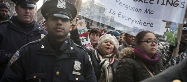 Demonstrators march in New York, Saturday, Dec. 13, 2014, during the Justice for All rally and march Demonstrators march in New York, Saturday, Dec. 13, 2014, during the Justice for All rally and march - Sputnik International