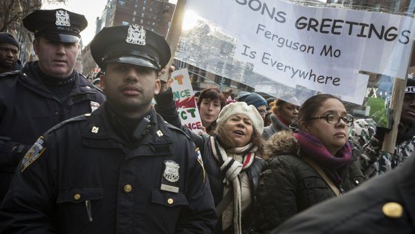 Demonstrators march in New York, Saturday, Dec. 13, 2014, during the Justice for All rally and march Demonstrators march in New York, Saturday, Dec. 13, 2014, during the Justice for All rally and march - Sputnik International