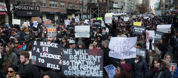 Demonstrators march in New York, Saturday, Dec. 13, 2014, during the Justice for All rally and march Demonstrators march in New York, Saturday, Dec. 13, 2014, during the Justice for All rally and march - Sputnik International