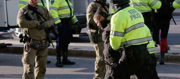 Police detain protestors during a demonstration against recent grand jury decisions not to indict police officers in the deaths of Michael Brown and Eric Garner, in Boston, Massachusetts December 13, 2014 Police detain protestors during a demonstration against recent grand jury decisions not to indict police officers in the deaths of Michael Brown and Eric Garner, in Boston, Massachusetts December 13, 2014 - Sputnik International