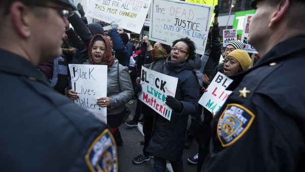 Demonstrators march in New York, Saturday, Dec. 13, 2014, during the Justice for All rally and march Demonstrators march in New York, Saturday, Dec. 13, 2014, during the Justice for All rally and march - Sputnik International