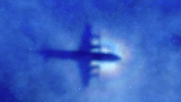 The shadow of a Royal New Zealand Air Force (RNZAF) P3 Orion looking for missing Malaysian Airlines flight MH370 The shadow of a Royal New Zealand Air Force (RNZAF) P3 Orion looking for missing Malaysian Airlines flight MH370 - Sputnik International