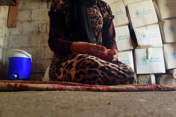 In this photo taken on October 8, 2014, a 15-year-old Yazidi girl captured by the Islamic State group and forcibly married to a militant in Syria. In this photo taken on October 8, 2014, a 15-year-old Yazidi girl captured by the Islamic State group and forcibly married to a militant in Syria. - Sputnik International