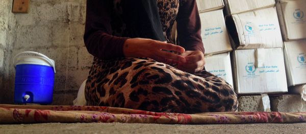 In this photo taken on October 8, 2014, a 15-year-old Yazidi girl captured by the Islamic State group and forcibly married to a militant in Syria. - Sputnik International