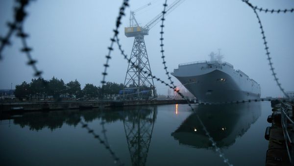 The Mistral-class helicopter carrier Vladivostok is seen at the STX Les Chantiers de l'Atlantique shipyard site in Saint-Nazaire - Sputnik International