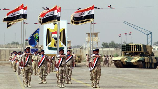 Iraqi Army soldiers march as part of a parade marking the founding anniversary of the army's artillery section in Baghdad Iraqi Army soldiers march as part of a parade marking the founding anniversary of the army's artillery section in Baghdad - Sputnik International