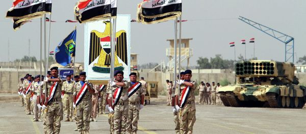 Iraqi Army soldiers march as part of a parade marking the founding anniversary of the army's artillery section in Baghdad Iraqi Army soldiers march as part of a parade marking the founding anniversary of the army's artillery section in Baghdad - Sputnik International