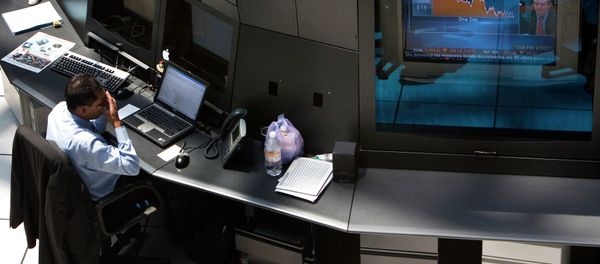 A man works at Mexico's stock exchange, or MBV, next to a television showing U.S. stock markets during trading in Mexico City A man works at Mexico's stock exchange, or MBV, next to a television showing U.S. stock markets during trading in Mexico City - Sputnik International