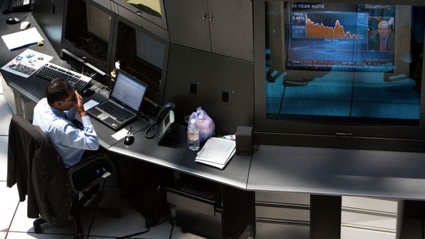 A man works at Mexico's stock exchange, or MBV, next to a television showing U.S. stock markets during trading in Mexico City A man works at Mexico's stock exchange, or MBV, next to a television showing U.S. stock markets during trading in Mexico City - Sputnik International