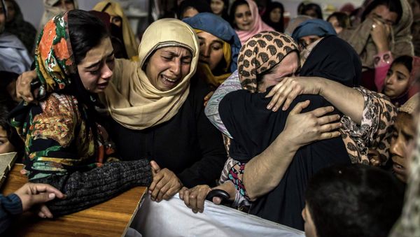Women mourn their relative Mohammed Ali Khan Women mourn their relative Mohammed Ali Khan - Sputnik International