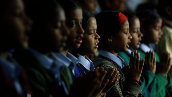 India schoolgirls offer prayers for victims killed in a Taliban attack India schoolgirls offer prayers for victims killed in a Taliban attack - Sputnik International