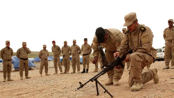 Sunni volunteers from Mosul take part in military training as they prepare to fight against militants of the Islamic State on the outskirts of Dohuk province December 8, 2014. Picture taken December 8, 2014. - Sputnik International