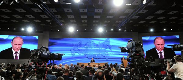 President of Russia Vladimir Putin during his tenth annual major news conference at the World Trade Centre President of Russia Vladimir Putin during his tenth annual major news conference at the World Trade Centre - Sputnik International