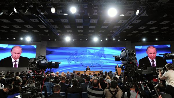 President of Russia Vladimir Putin during his tenth annual major news conference at the World Trade Centre President of Russia Vladimir Putin during his tenth annual major news conference at the World Trade Centre - Sputnik International