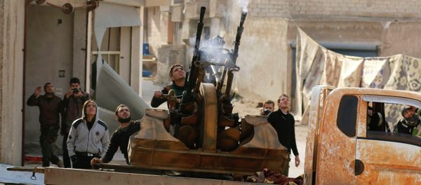 Free Syrian Army fighters fire an anti-aircraft weapon towards forces loyal to Syria's President Bashar al-Assad in the Handarat area, north of Aleppo. - Sputnik International