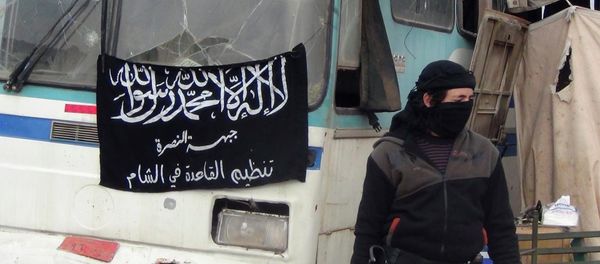 A member of Islamist Syrian rebel group Jabhat al-Nusra mans a checkpoint on the border crossing between Syria and Jordan, which they claim to have taken control of, in Daraa December 26, 2013. A member of Islamist Syrian rebel group Jabhat al-Nusra mans a checkpoint on the border crossing between Syria and Jordan, which they claim to have taken control of, in Daraa December 26, 2013. - Sputnik International