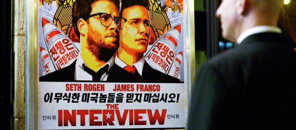 A security guard stands at the entrance of United Artists theater during the premiere of the film The Interview in Los Angeles, California in this December 11, 2014 file photo. A security guard stands at the entrance of United Artists theater during the premiere of the film The Interview in Los Angeles, California in this December 11, 2014 file photo. - Sputnik International