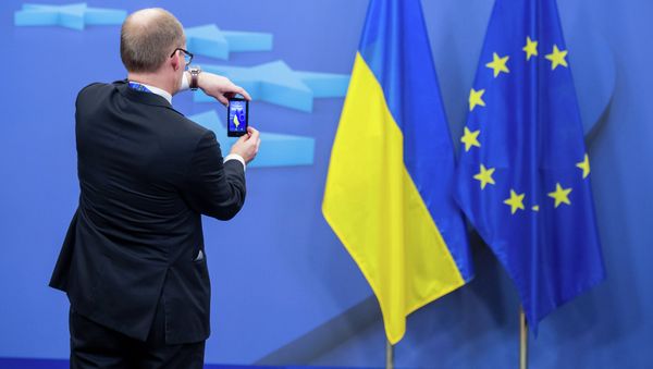 Ukrainian and EU flags Ukrainian and EU flags - Sputnik International