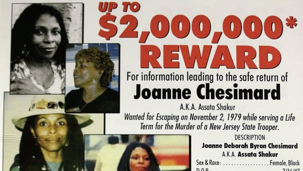 A poster with photographs of Joanne Chesimard - Sputnik International