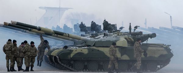 Ukrainian soldiers get new tanks and other military vehicles at a military base in the eastern town of Chuguyev, Ukraine, Saturday, Dec. 6, 2014 Ukrainian soldiers get new tanks and other military vehicles at a military base in the eastern town of Chuguyev, Ukraine, Saturday, Dec. 6, 2014 - Sputnik International