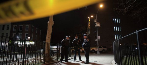 Police are pictured at the scene of a shooting where two New York Police officers were shot dead in the Brooklyn borough of New York, December 20, 2014 - Sputnik International