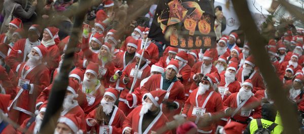 Hundreds of Santas take part in a charity run through Gorky Park; the run was just one of a a number of events organized across Russian cities this past Sunday. Hundreds of Santas take part in a charity run through Gorky Park; the run was just one of a a number of events organized across Russian cities this past Sunday. - Sputnik International