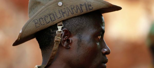 The Boko Haram Islamist group has released a propaganda video showing the execution of dozens of civilian 'non-believers'. The Boko Haram Islamist group has released a propaganda video showing the execution of dozens of civilian 'non-believers'. - Sputnik International