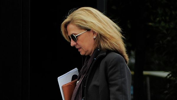 Spain's Princess Infanta Cristina walks toward her office in Barcelona, Spain - Sputnik International