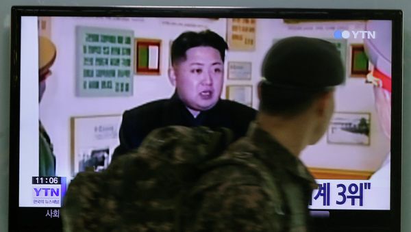 A South Korean army soldier watches a TV news program showing North Korean leader Kim Jong Un at the Seoul Railway Station in Seoul, South Korea, Monday, Dec. 22, 2014 A South Korean army soldier watches a TV news program showing North Korean leader Kim Jong Un at the Seoul Railway Station in Seoul, South Korea, Monday, Dec. 22, 2014 - Sputnik International