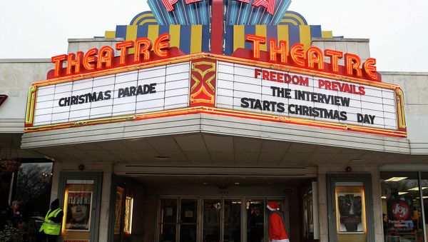 A man dressed as Santa Claus walks under the marquee at the Plaza Theatre that will be showing the movie The Interview beginning Christmas Day in Atlanta, Georgia December 23, 2014 A man dressed as Santa Claus walks under the marquee at the Plaza Theatre that will be showing the movie The Interview beginning Christmas Day in Atlanta, Georgia December 23, 2014 - Sputnik International