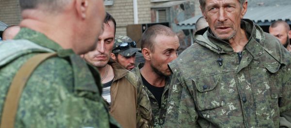Captured Ukrainian soldiers taken out of the encirclement in Ilovaisk, near Donetsk Captured Ukrainian soldiers taken out of the encirclement in Ilovaisk, near Donetsk - Sputnik International