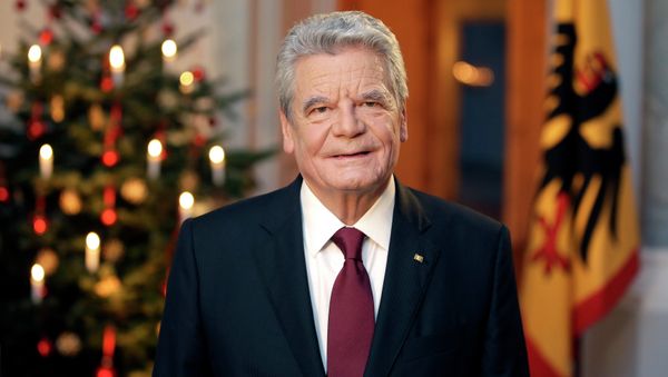 German President Joachim Gauck poses after the recording of the traditional Christmas message at Bellevue Palace in Berlin, December 22, 2014 German President Joachim Gauck poses after the recording of the traditional Christmas message at Bellevue Palace in Berlin, December 22, 2014 - Sputnik International