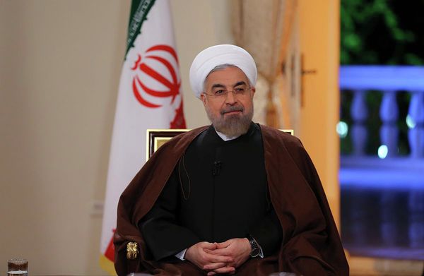 In this photo released by the Iranian Presidency Office, President Hassan Rouhani attends an interview with the state-run TV in Tehran, Iran, on Monday, Oct. 13, 2014 - Sputnik International