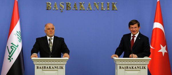 Iraqi Prime Minister Haider al-Abadi and Turkey's Prime Minister Ahmet Davutoglu (R) addresses the media in Ankara December 25, 2014 Iraqi Prime Minister Haider al-Abadi and Turkey's Prime Minister Ahmet Davutoglu (R) addresses the media in Ankara December 25, 2014 - Sputnik International