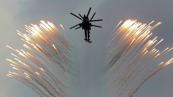 A couple of Russian Army helicopters fly over the Monument to Scuttled Ships, during a promotional campaign for contract service for Russian Army in Sevastopol - Sputnik International