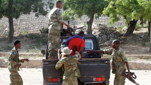 A blind-folded suspect is detained by Somalia security forces after attackers from the militant group al Shabaab invaded the African Union's Halane base on the edge of the Mogadishu international airport compound in Somalia's capital Mogadishu - Sputnik International