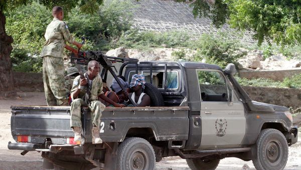 Somalia security forces transport blind-folded suspects detained on their pick-up truck after attackers from the militant group al Shabaab invaded the African Union's Halane base on the edge of the Mogadishu international airport compound in Somalia's capital Mogadishu - Sputnik International