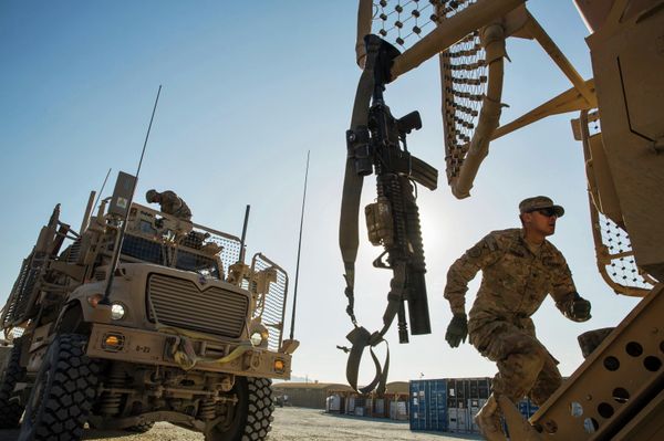 A U.S. soldier from Dragon Company of the 3rd Cavalry Regiment prepares for a mission on forward operating base Gamberi in the Laghman province of Afghanistan - Sputnik International