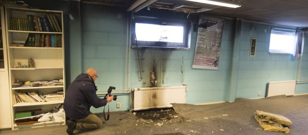 Police officers investigate a suspected arson attack after a fire in the basement of a mosque in the southern Swedish town of Eslov, Monday Dec. 29, 2014 Police officers investigate a suspected arson attack after a fire in the basement of a mosque in the southern Swedish town of Eslov, Monday Dec. 29, 2014 - Sputnik International
