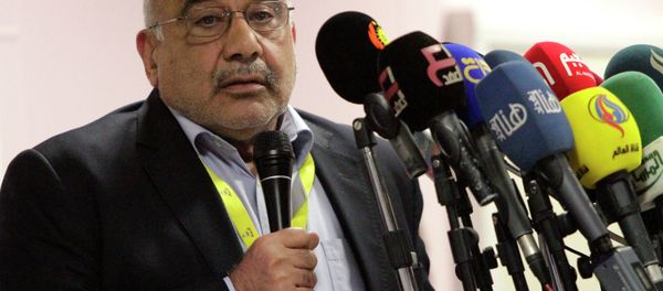 Oil Minister Adel Abdel Mehdi speaks during a news conference at Rumaila oilfield in Basra, southeast of Baghdad December 17, 2014 Oil Minister Adel Abdel Mehdi speaks during a news conference at Rumaila oilfield in Basra, southeast of Baghdad December 17, 2014 - Sputnik International