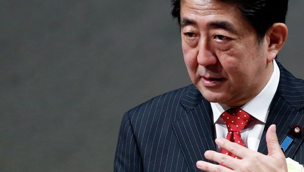 Japan's Prime Minister Shinzo Abe speaks during a year end meeting at Japan Business Federation (Keidanren) in Tokyo December 25, 2014 - Sputnik International