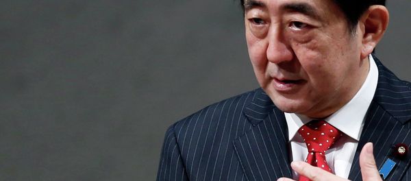 Japan's Prime Minister Shinzo Abe speaks during a year end meeting at Japan Business Federation (Keidanren) in Tokyo December 25, 2014 - Sputnik International