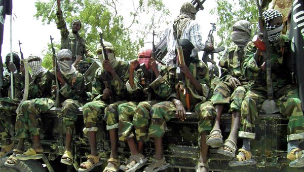 Al-Shabaab fighters display weapons as they conduct military exercises in northern Mogadishu, Somalia Al-Shabaab fighters display weapons as they conduct military exercises in northern Mogadishu, Somalia - Sputnik International