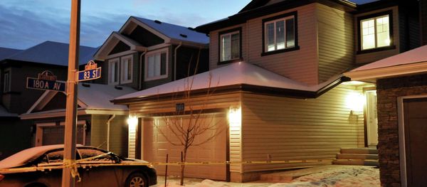 Police cordon tape surrounds a house (R, with lights on) where seven people were found dead Police cordon tape surrounds a house (R, with lights on) where seven people were found dead - Sputnik International
