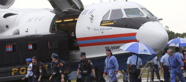 Russian rescuers unload gears from their Beriev Be-200 amphibious aircraft upon arrival to reinforce a search operation for the victims and the wreckage of AirAsia Flight 8501 at Pangkalan Bun Airport, Indonesia Russian rescuers unload gears from their Beriev Be-200 amphibious aircraft upon arrival to reinforce a search operation for the victims and the wreckage of AirAsia Flight 8501 at Pangkalan Bun Airport, Indonesia - Sputnik International