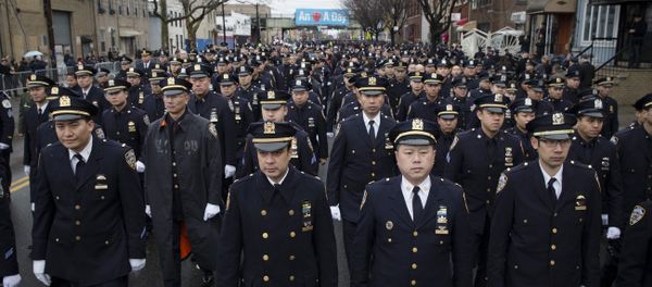Police officers arrive to the funeral of New York Police Department Officer Wenjian Liu at Aievoli Funeral Home in the Brooklyn borough of New York Police officers arrive to the funeral of New York Police Department Officer Wenjian Liu at Aievoli Funeral Home in the Brooklyn borough of New York - Sputnik International