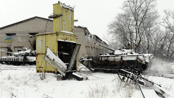 A Ukrainian Army tank and APC - Sputnik International