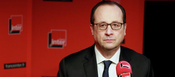 French President Francois Hollande prepares to answer questions during a live interview at the France Inter radio station studios in Paris French President Francois Hollande prepares to answer questions during a live interview at the France Inter radio station studios in Paris - Sputnik International
