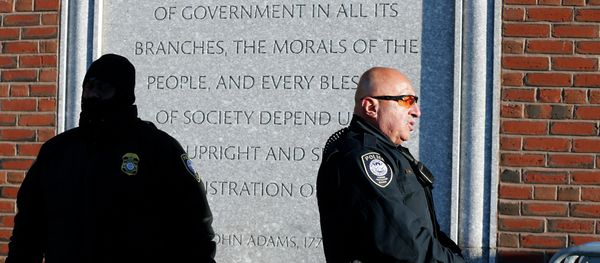 Police officers stand outside the federal courthouse in Boston for the first day of jury selection in the trial of Boston Marathon bombing suspect Dzhokhar Tsarnaev - Sputnik International